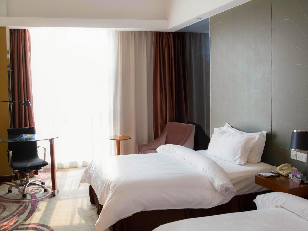 Metropolo, Zhenjiang, Railway Station Wanda Plaza Hotel Женджанг Екстериор снимка